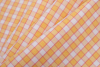 Citrus Yellow and Cotton Candy Pink Checked Handwoven Cotton - Folded | Mood Fabrics
